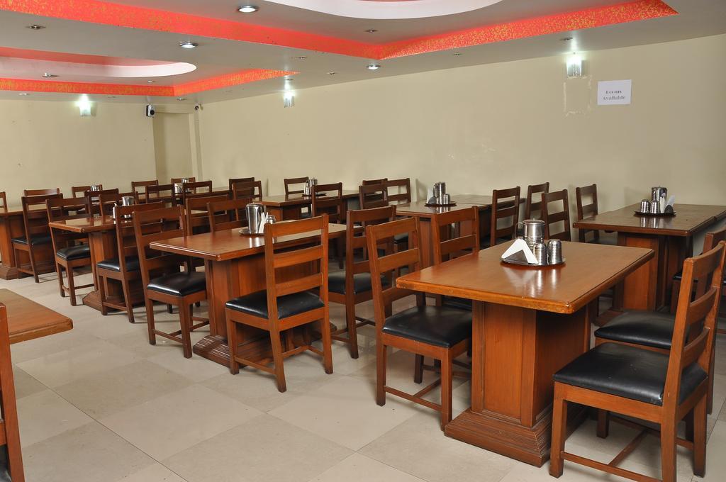 קודאיקנאל Grand Paradise Inn מראה חיצוני תמונה