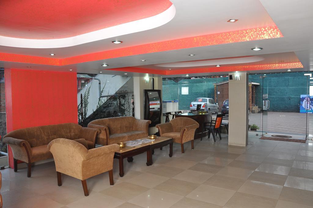 קודאיקנאל Grand Paradise Inn מראה חיצוני תמונה