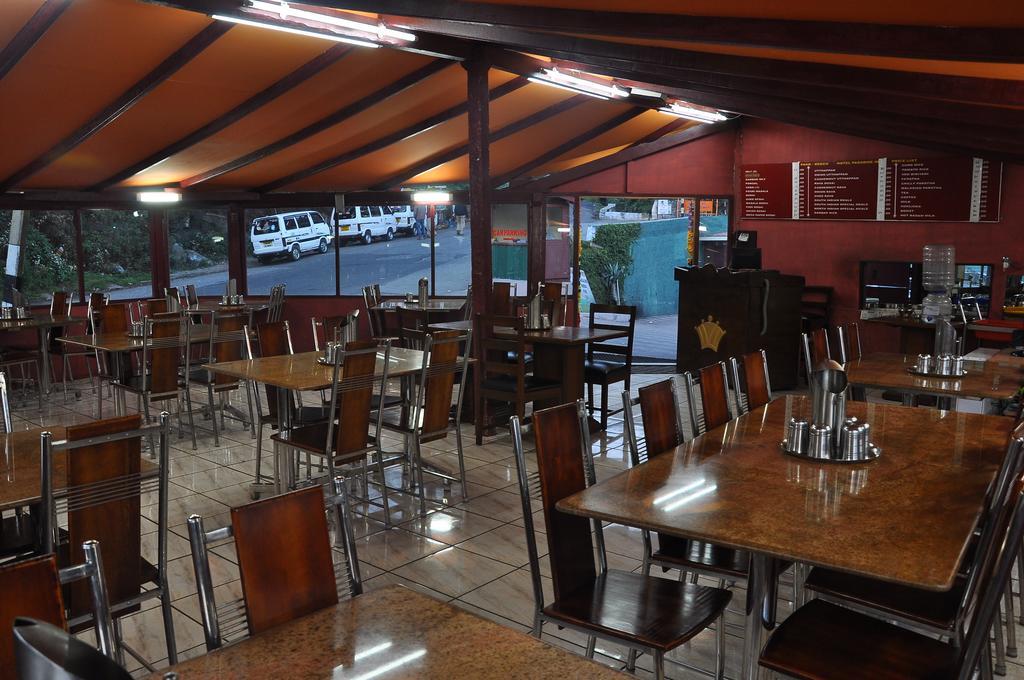 קודאיקנאל Grand Paradise Inn מראה חיצוני תמונה