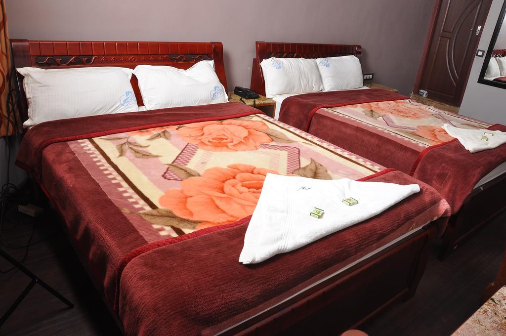 קודאיקנאל Grand Paradise Inn מראה חיצוני תמונה