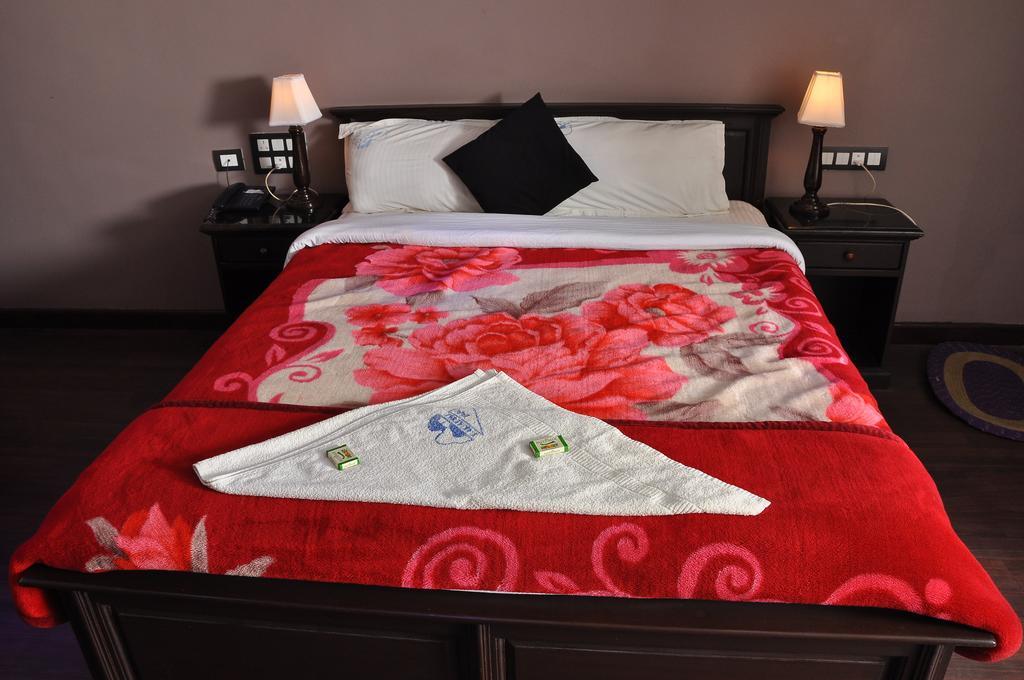 קודאיקנאל Grand Paradise Inn חדר תמונה