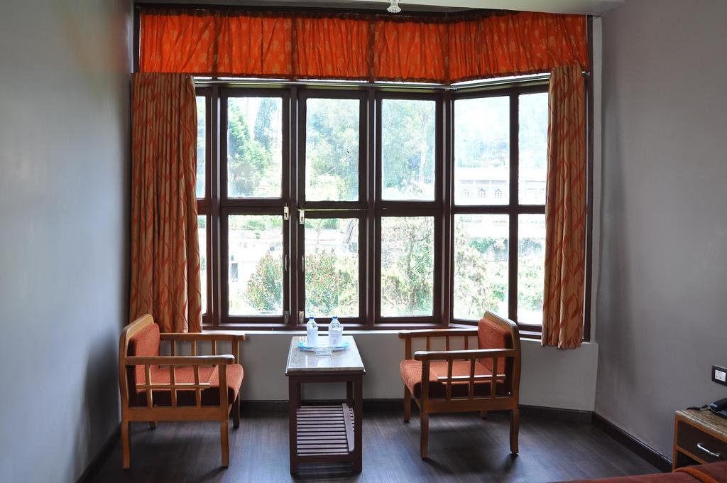 קודאיקנאל Grand Paradise Inn חדר תמונה
